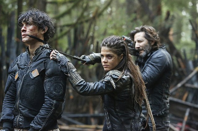 Bob Morley, Marie Avgeropoulos and Henry Ian Cusick in The 100 episode "Fallen." Photo Credit: The CW